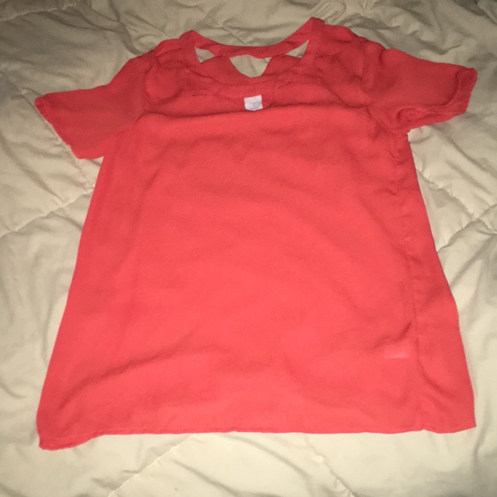 I am selling an orange blouse